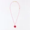 Beaded Necklace with Hibiscus Pendant