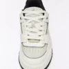 Voluminous Sneakers with Pieces – Trainers